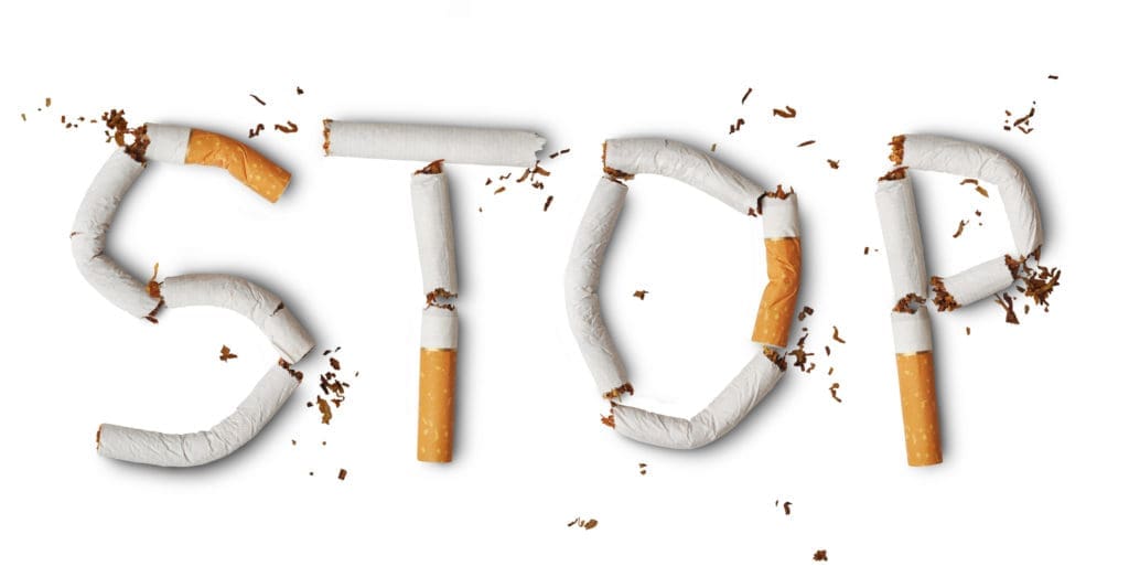 A word made out of cigarettes that is broken.