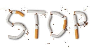 A word made out of cigarettes that is broken.